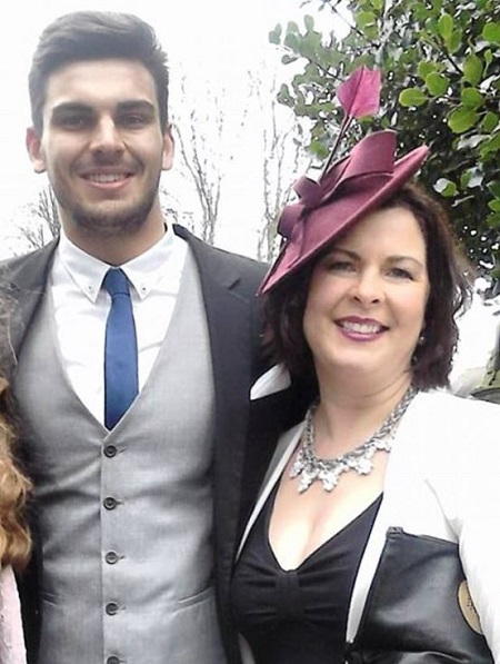 Adam Collard with his mother