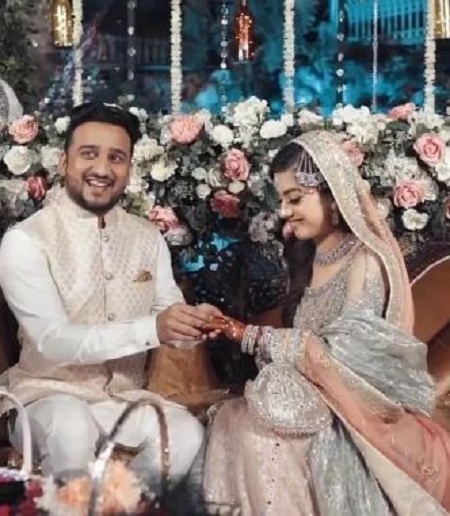 Arisha Razi Khan with her husband