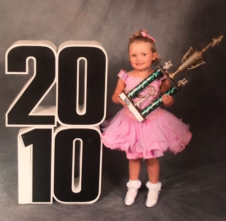 Childhood photo of Alana