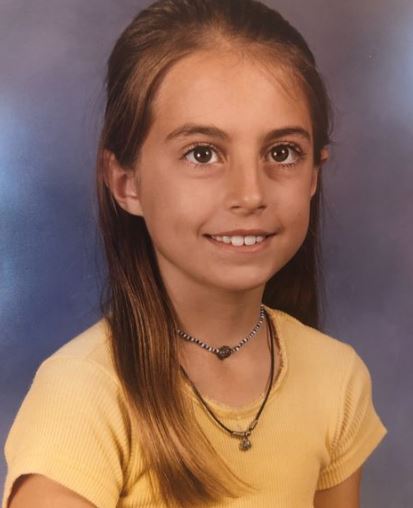 Childhood photo of Camille