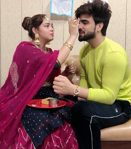 Inder Chahal celebrating Raksha Bandhan with his sisters