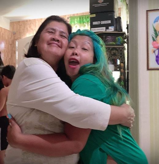 Madam with her mom