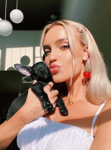 Morgan Riddle with her pet dog