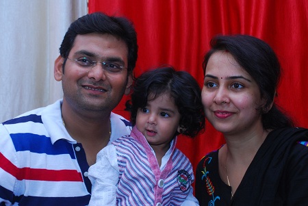 Rohit Ranjan with his wife and daughter