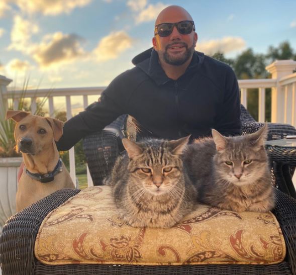 Virzi with his pet cats