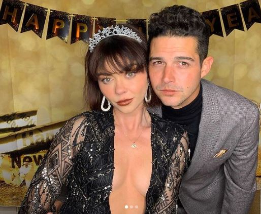 Adams with his wife Sarah Hyland