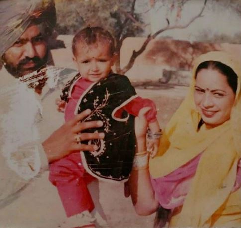 Childhood photo of Mankirt with his parents