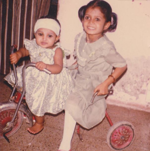 Happy Bhavasar childhood image with younger sister