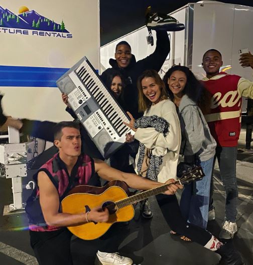 Kendall with the cast Purple Hearts