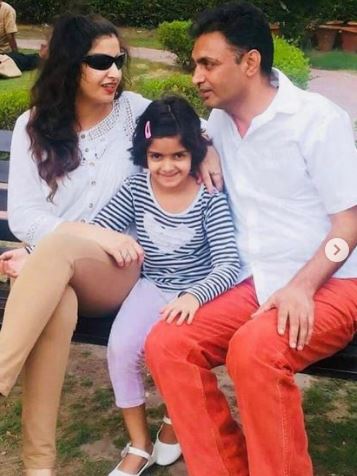 Sonali with her husband Sanjay Phogat and daughter Yashodhra Phogat