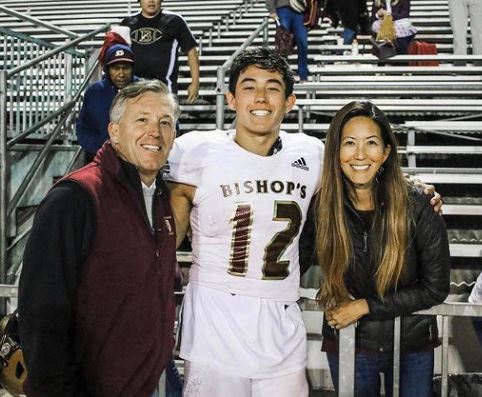 Tyler Buchner with his dad and mom