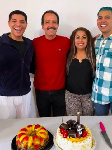 Caz with his family