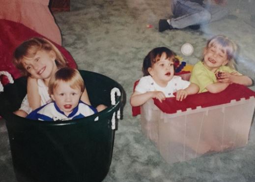 Childhood photo of Lily with her siblings