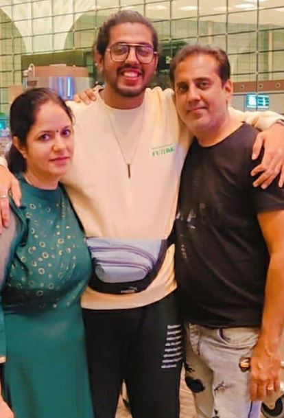 Kavita Chawla with her husband and son