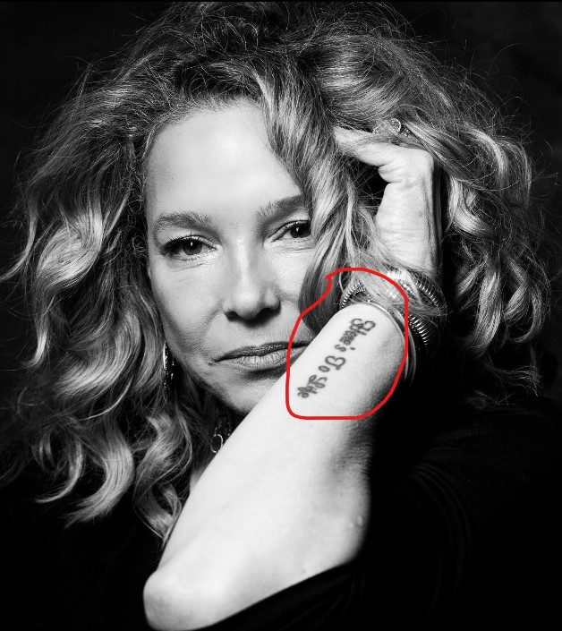 Kitt Shapiro inked tattoo on her arm