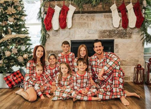 Neal with his wife and kids