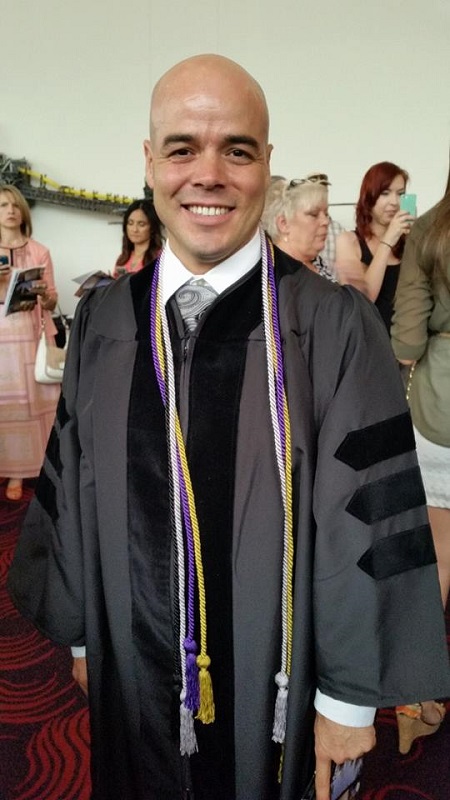 Robert Telles law school graduation picture