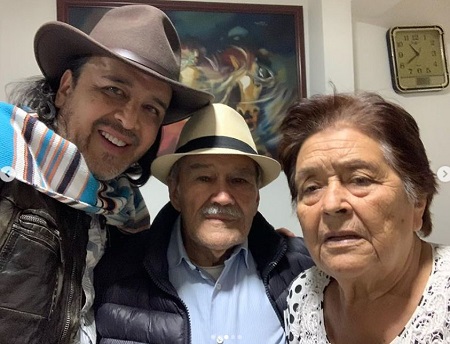 Toto Vega with his parents
