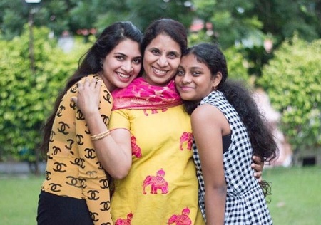 Anchor Meghana Kumar with her mother and sister
