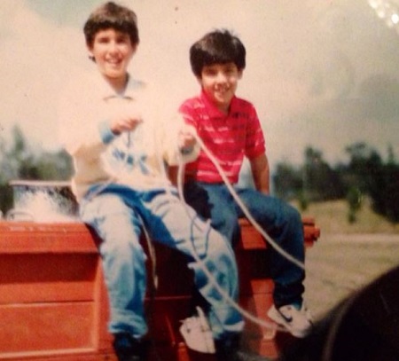 Andres Cuervo childhood picture with his brother Nando