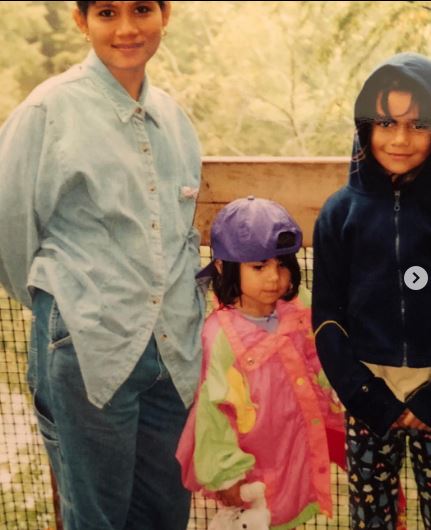 Childhood photo of Brittany with her mom and sister