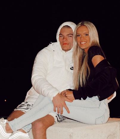 Elijah DeWitt with his girlfriend