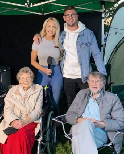 Emma with her brother and grandparents