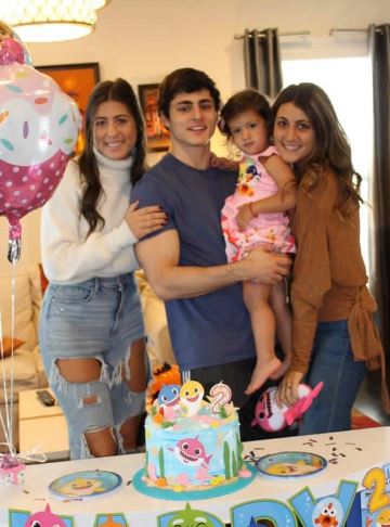 Gianluca Conte with his sisters