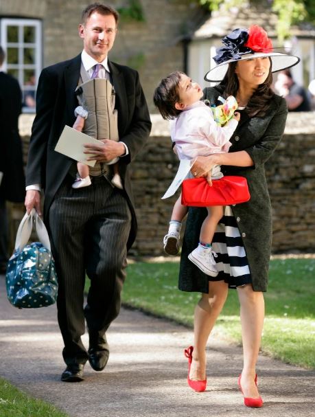Lucia Guo with her husband and kids