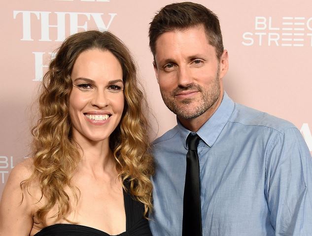 Philip and his wife Hilary Swank