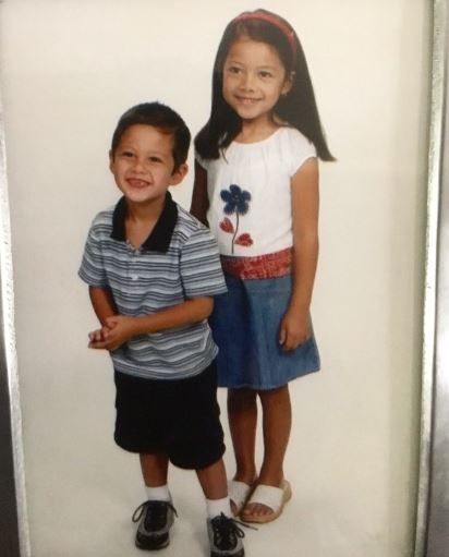 Rhys Miguel childhood image with his sister