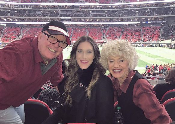 Sarah with her parents