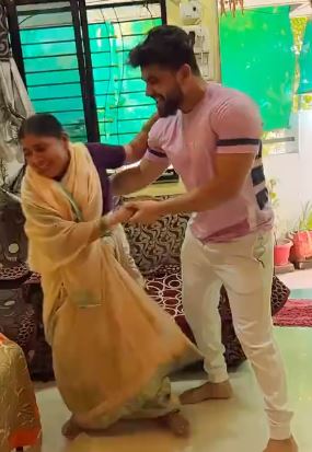 Shiv Thakare with his mother