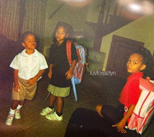 Young Mychelle with her siblings