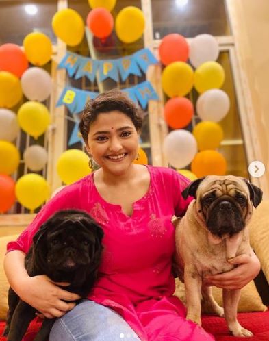 Aindrila with her pet dogs