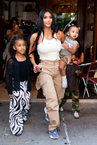 An old photo of North with her mom Kim Kardashian and sister