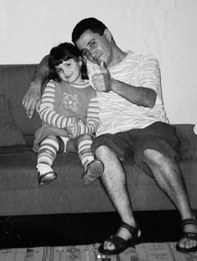 Childhood photo of Gabriela with her father