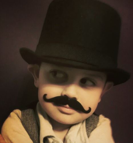 Childhood photo of Isaac