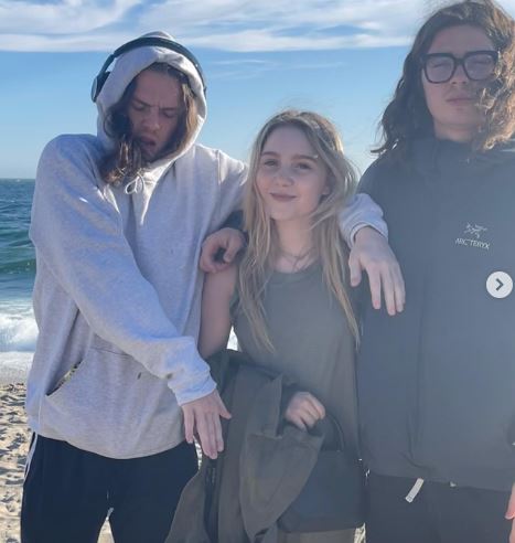 Ella Anderson with her brothers