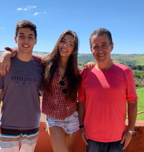Gabriela with her dad and brother Rafael