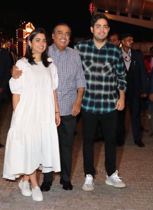 Isha with her father and brother