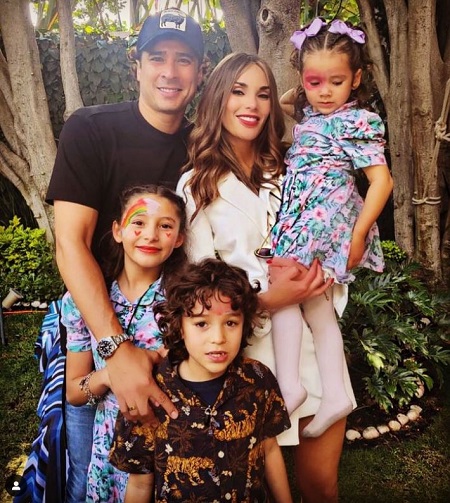Karla Mora with her husband and kids