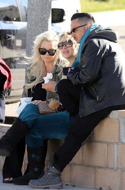 Martin seen sobbing outside Aaron Carter's home