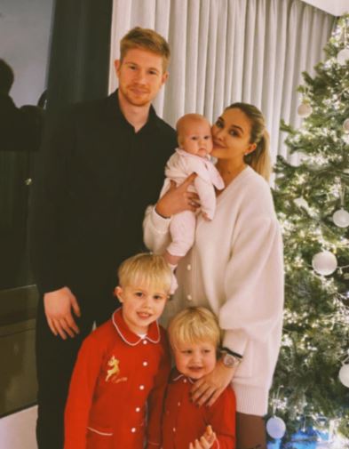 Michele Lacroix with her spouse, daughter and sons