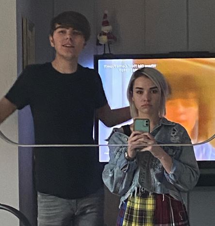 NYYXXII with her brother