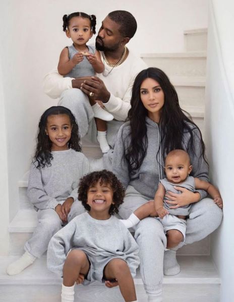Psalm West with his dad mom and siblings