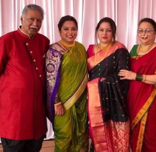 Vrushali Gokhale with her spouse and daughters