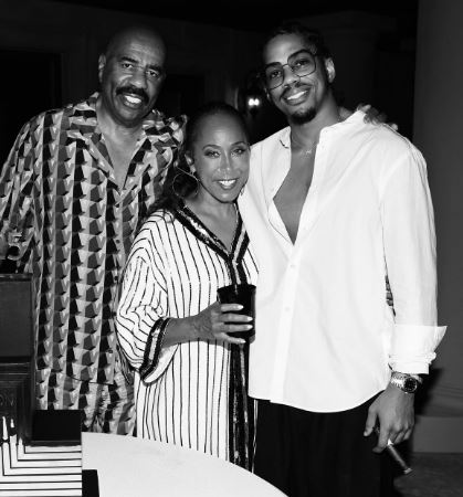 Wynton Harvey with his father and step mother