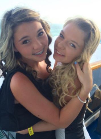 Young Kaylee with her friend Madison
