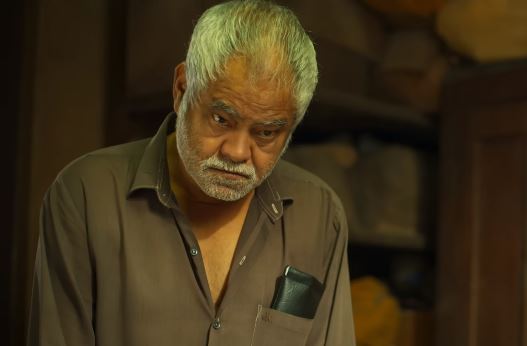 Actor Sanjay Mishra as Shambhunath Mishra